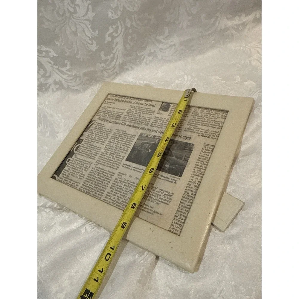 image framed‎ newspaper clipping funeral Lee Randall longtime Cadillac mechanic